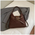 Close-up of dark brown suede tote bag with leather straps and gold metal ring detail - Coffee No Charm