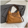 Detail view of large brown suede tote bag with magnetic flap closure and metal rivets - Brown No Pendant