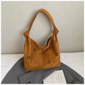 Detail of brown faux suede tote bag with hollow flower patterns and knot strap design - Brown