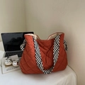Quilted tote bag in orange with striped strap and large capacity stylish design - Orange