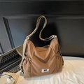Brown large capacity canvas tote bag with side pockets and Myron Bear logo label - Brown