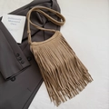 Detail view of retro khaki fringe crossbody bag with suede texture and boho styling - Beige Grey