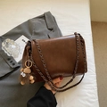 Large dark brown PU leather tote bag with chain strap and plush pendant for daily commute - With Charm / Brown