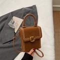 Vertical mini square crossbody bag in deep caramel suede with gold woven twist lock - Brown