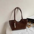 Brown vintage leather tote bag with unique wavy design and beaded charm accessory - With Pendant / Brown