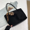 Black patchwork tote bag with suede texture, leopard print charm, and long shoulder strap - Black with Pendant