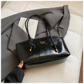 Glossy black faux leather tote bag with unique gold-capped knot handles and chic branding - Black without Pendant