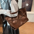 Vintage grote shopper van donkerbruin PU-leer met decoratieve riemen en metalen haken - Bruin