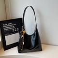 Detail of black hobo tote with contrast white stitching and ethnic beaded charm tassel - Black With Pendant