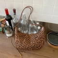 Leopard print crescent hobo bag with brown leather straps and gold zipper detail - Leopard Print No Charm