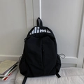 Minimalist black travel backpack for students featuring white lettering and side drawstring - No Pendant / Black