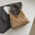 Brown suede hobo bag with adjustable strap and silver buckle for minimalist styling - Khaki