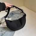 Minimalist black crescent crossbody bag made of durable nylon with adjustable strap - Black