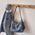 Retro blue denim hobo bag with brown leather straps and stylish vertical zipper detail - Blue Without Charm