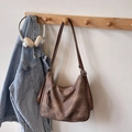Vintage brown leather tote bag with adjustable strap and metallic logo plaque detail - Coffee No Charm