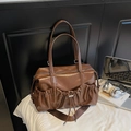 Vintage brown bowling bag with multiple drawstring pockets and wide shoulder strap - Brown