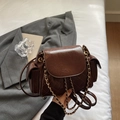 Dark brown quilted leather backpack with gold chain straps and vintage wax finish - Coffee