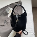 Borsa a secchiello minimalista in camoscio nero con manici in pelle e fibbia dorata - Nero