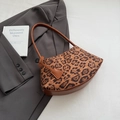 Retro leopard print shoulder bag with brown leather bottom and matching strap detail - Leopard Brown