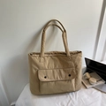 Minimalist khaki tote bag with front pocket and shoulder straps for daily commuting - Khaki