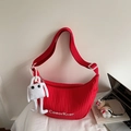 Red quilted dumpling crossbody bag with white plush charm and Caerkvor logo branding - Wine Red With Pendant