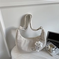Detailed texture of off-white corduroy crescent bag with a cute plush cloud charm detail - With Pendant / White
