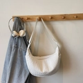 White dumpling-style crossbody bag with vertical quilted texture and adjustable strap - Off-white Without Pendant