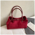 Detailed close-up of dark red tote bag showing contrast between matte suede and patent leather - Red Small