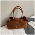 Close-up of brown suede tote bag featuring slim leather strap and gold metal buckle detail - Brown Small