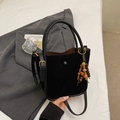 Large black faux suede bucket bag with wooden bead tassel and adjustable shoulder strap - Black (With Pendant)