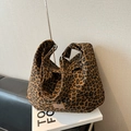 Japanese style leopard print canvas dumpling bag with brown leather label and silver buckle - Brown No Pendant