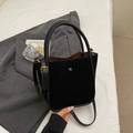 Retro black suede bucket bag with smooth leather trim and adjustable gold-tone strap - Black (Without Charm)
