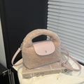 Plush crossbody bag in beige and pink faux leather with a chic tassel fringe finish - Pink (No Charm)