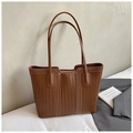 Detailed close-up of dark brown woven leather tote bag with white contrast stitching - Brown Without Pendant Style