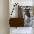 Chic brown suede crossbody bag with minimalist flap design and thin tubular straps - No Pendant / Brown