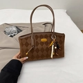 Brown faux suede underarm bag with diamond quilted texture and beaded tassel charm - Brown with Pendant