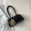 Minimalist black faux suede shoulder bag with gold buckle and cute brown teddy bear charm - With Charm / Black