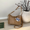 Brown suede tote bag with long leather straps and cute teddy bear charm on marble surface - Khaki with Pendant