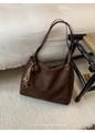 Detail of dark brown suede tote bag with heart leather charm and beaded tassel accents - With Pendant / Coffee