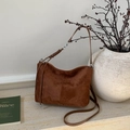Brown suede crossbody dumpling bag with stitching details and silver chain strap - Brown No Pendant