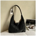 Detail of black suede hobo bag with contrast stitching and urban lifestyle accessories - Black