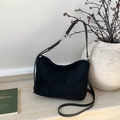 Minimalist black suede crossbody crescent bag with adjustable leather strap and silver hardware - Black without Pendant