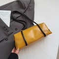 Minimalist bright yellow leather shoulder bag with sleek black tubular straps - No Pendant / Yellow