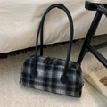 Close-up of black and white plaid wool handbag with long leather handles and top zippers - Black