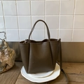Minimalist deep brown crossbody bag with lychee texture and pleated sides - Tan Without Charm