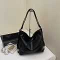 Minimalist black tote bag in matte finish with double straps and diagonal zipper pocket - Black