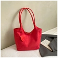 Bolso tote minimalista en ante rojo con asas dobles y decoración de amuleto circular - Rojo