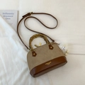 Retro contrast shell bag with bamboo handle, matte finish, and plush eye charm detail - Khaki (No Pendant)