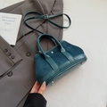 Deep teal vintage-style handbag with patchwork suede and smooth leather finishes - Blue