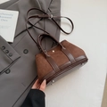 Stylish deep brown patchwork leather handbag with adjustable strap for casual wear - Brown